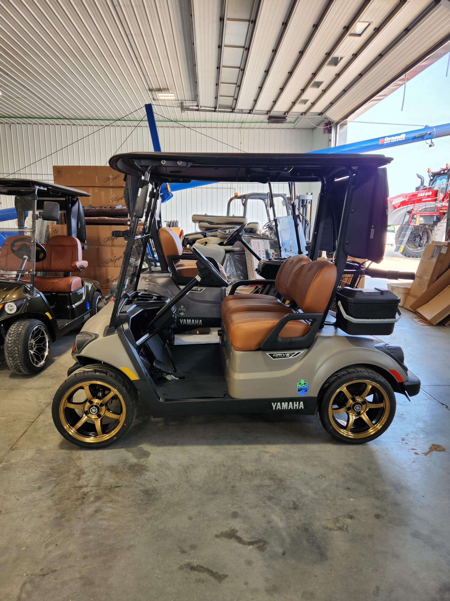 Champagne Yamaha Drive2 with tan leather seats and bronze wheels