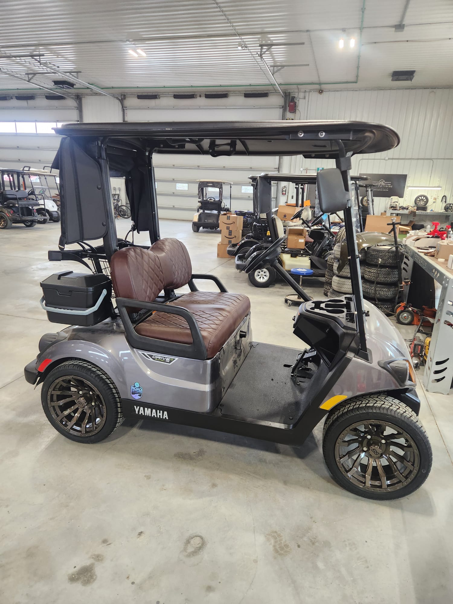 Grey Yamaha Drive2 with brown diamond-stitched seats and black wheels