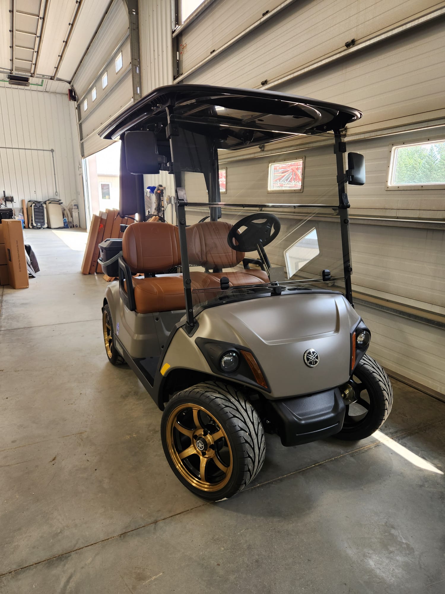 Matte silver 2027 Yamaha Drive2 with brown leather seats and gold wheels