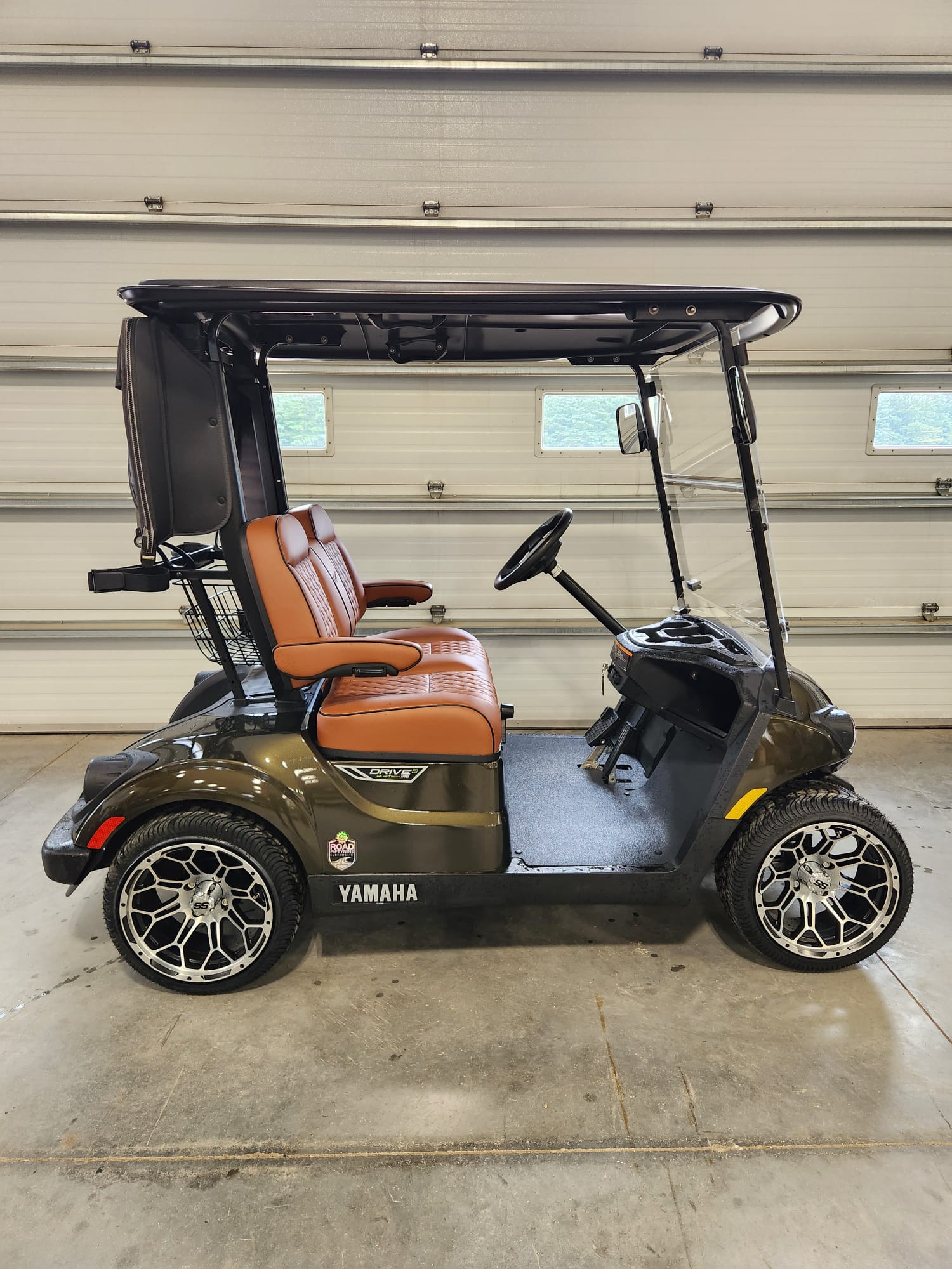 Olive bronze Yamaha Drive2 with tan diamond-stitched seats