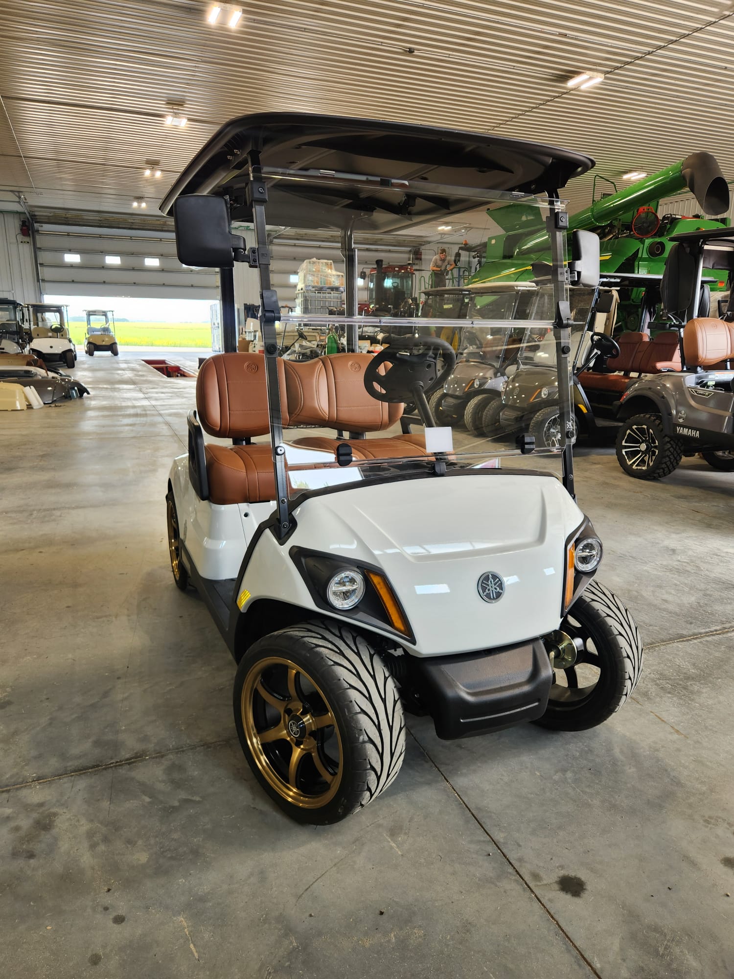 White 2026 Yamaha Drive2 front view inside the shop