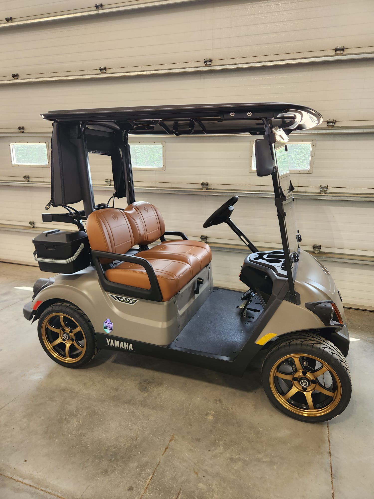 Champagne 2027 Yamaha Drive2 with tan leather seats and gold wheels