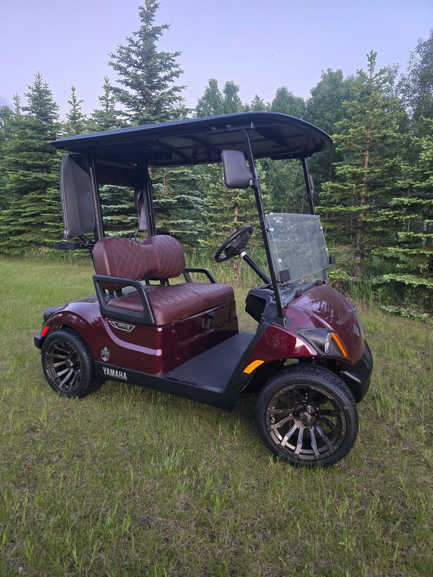 Burgundy Yamaha Drive2 in the trees